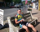 Luke Keough relaxes during a mid-ride ice cream break. © Molly Hurford