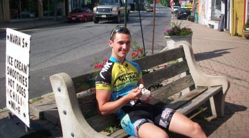 Luke Keough relaxes during a mid-ride ice cream break. © Molly Hurford