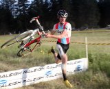 Zach McDonald flies through the barriers at the Raleigh Midsummer Night cyclocross race. © Cyclocross Magazine