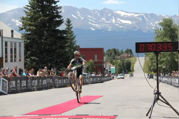 Tim Johnson crosses the line doing a wheelie at the Leadville 100. Brian Patrick - OnSight Media.