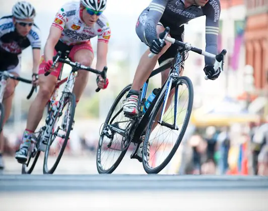 Craig Richey rides at the front of the break in Bastion Square in Victoria, BC