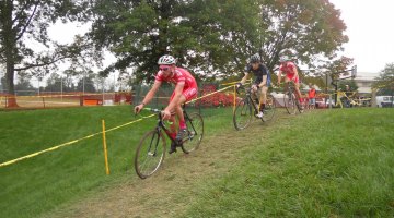 Lukas Winterberg and Lukas Muller of Philadelphia Cyclocross School surround Bad Andy Wulfkuhle (C3 Athletes Serving Athletes).