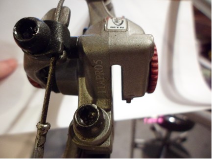 If the inboard pad is too far out, when you actuate the brake the outboard pad will clamp the rotor against the caliper instead of the brake pad. © Jason Gardner If the inboard pad is too far out, when you actuate the brake the outboard pad will clamp the rotor against the caliper instead of the brake pad. © Jason Gardner