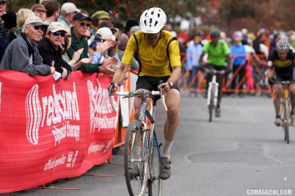 Carl Decker crosses the line Sunday for the win at Sunday's Halloween Cross Crusade costume race. ©Pat Malach