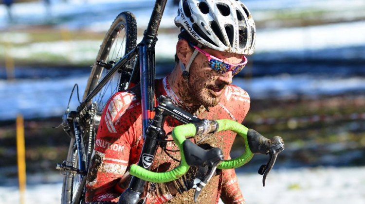 HPCX winner Lukas Winterberg runs through the mud on the off-camber section. © Ethan Glading