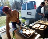 Jeremy Durrin served up sausages at CSI to try to raise funds for his trip. Cyclocross Magazine