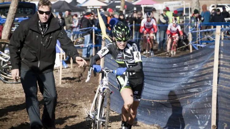 Kaitlin Antonneau grabs a clean bike from cyclocross guru Stu Thorne on her way to an Elite silver and an U23 gold.. © Cyclocross Magazine