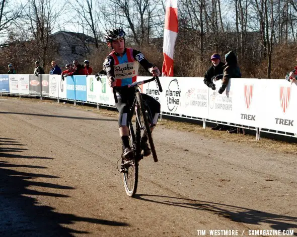 Zach MacDonald (Team Rapha-Focus) executes his trademark wheelie as he becomes the U23 2012 National Cyclocross Champion. ©Cyclocross Magazine