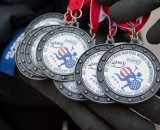 Participant medals are readied for all who finish the UCI Masters Cyclocross World Championships.