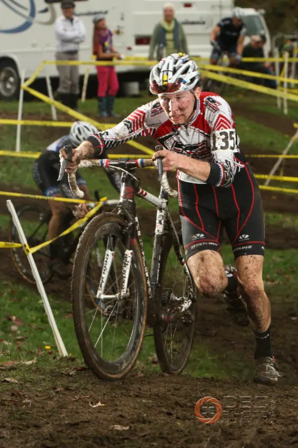 Logan Owen running the tough sidehill section ahead of Steve Fisher. © Dennis Crane