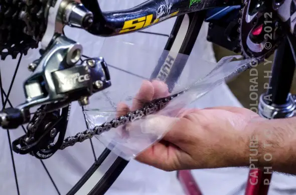 Chandler Snyder shows some quick and dirty ways that anyone can keep a drivetrain running smoothly, muddy race after muddy race. © Colorado Capture