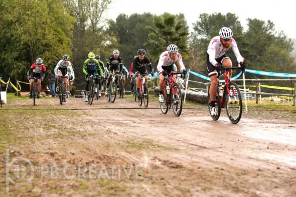 In pouring rain, Brandon “Big Red” Gritters (Rock n’ Road) shoots to an early Men’s A lead. © Phil Beckman In pouring rain, Brandon “Big Red” Gritters (Rock n’ Road) shoots to an early Men’s A lead. © Phil Beckman