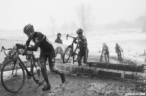 Jon Cariveau (Moots) leads Don Myrah (Ibis BuyCell) up the barriers. @ Cyclocross Magazine