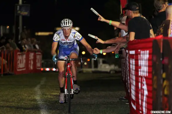 Christian Helmig grabs the money at CrossVegas 2012. ©Thomas van Bracht / Cyclocross Magazine