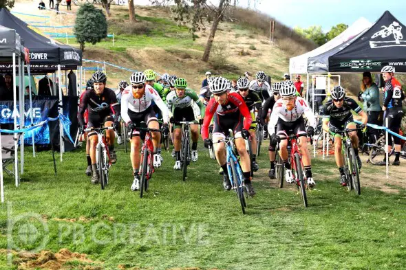 At the start of Men’s A, Brent Prenzlow (Celo Pacific/Focus) leads the Gritters brothers (Rock n’ Road) into turn one. © Phil Beckman/PB Creative