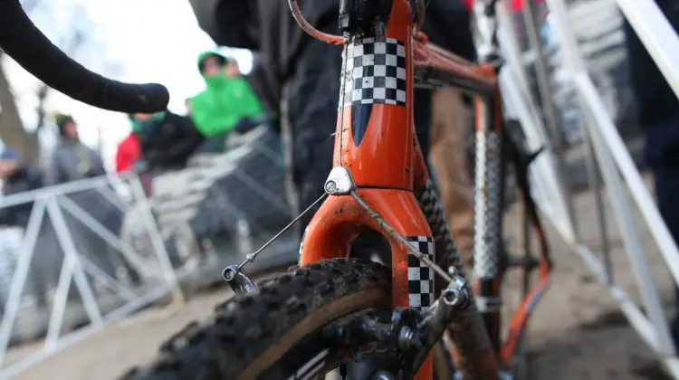 Checkered tape mask the Blue branding, but the Challenge Limus Team Edition tubulars and Shimano CX70 cantilevers are fully visible. © Meg McMahon