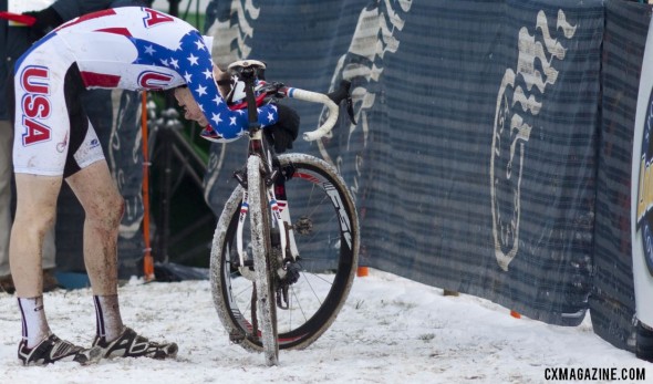 Logan Owen collapses in exhaustion, emotion, and disappointment after his fourth place finish at the 2013 Cyclocross World Championships. © Andrew Yee, Cyclocross Magazine