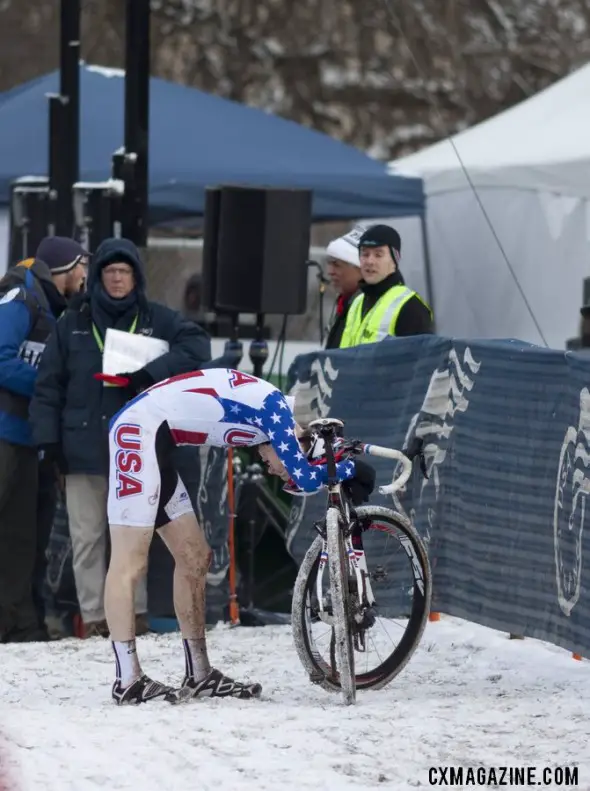 Logan Owen collapses in exhaustion, emotion, and disappointment after his fourth place finish at the 2013 Cyclocross World Championships. © Andrew Yee, Cyclocross Magazine