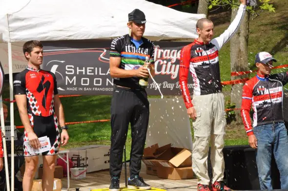 Brad White pops the champagne at last year's Ithaca GP_ he is flanked by Sven Baumann and Tom Burke (photo Curt Potocki) Brad White pops the champagne at last year's Ithaca GP_ he is flanked by Sven Baumann and Tom Burke (photo Curt Potocki)