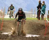 Alex Revell enjoys the mud pit in today’s National Championship race in Wanaka. © Amy Taylor