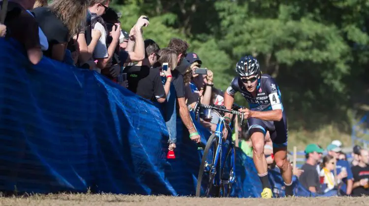 Jamey Driscoll pushing past the beer garden on Day 1 of Gloucester. © Todd Prekaski