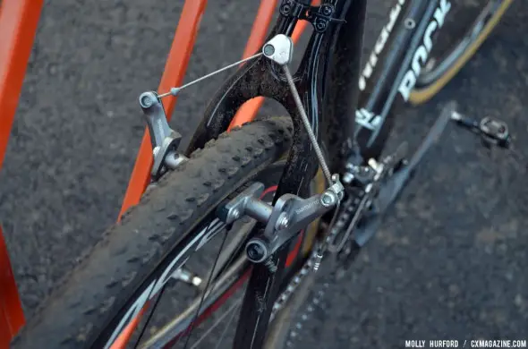 Shiimano CX70 cantilever brakes and well-worn Challenge Fango tubulars handle traction and slowing. © Cyclocross Magazine Shiimano CX70 cantilever brakes and well-worn Challenge Fango tubulars handle traction and slowing. © Cyclocross Magazine