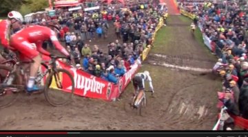 Kevin Pauwels crashes into the fencing at the 2013 Hamme-Zogge Superprestige cyclocross race.