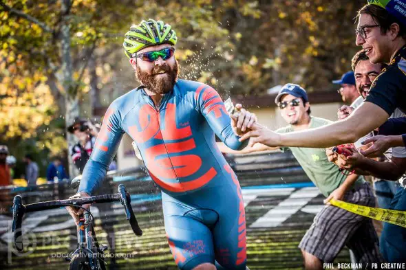 Kyle Kelley picks up a buck and gets hosed with red wine. Wine? At a CX? Things are done a little differently in SoCal.