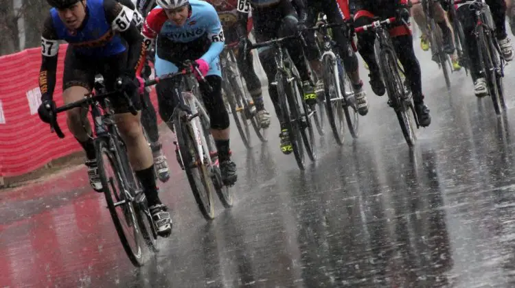 Charging onto the muddy, wet course at the North Carolina Grand Prix. © Marcia Seiler