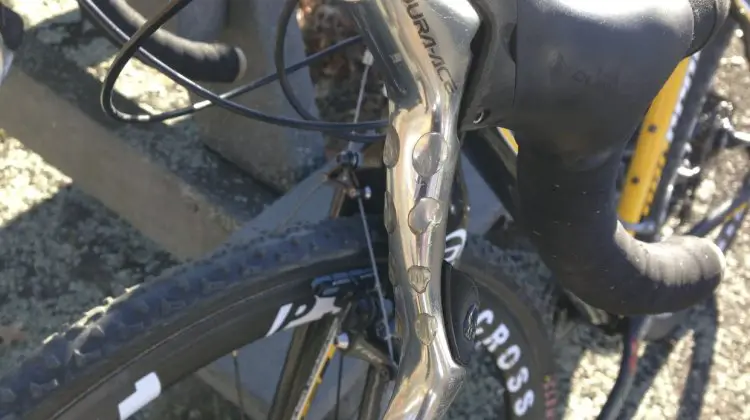 Laura van Gilder uses hot melt glue to add grip to her brake levers. © Andrew Reinmann / Cyclocross Magazine