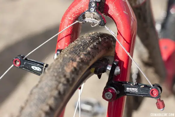 Challenge Chicane tubulars and Avid Shorty Ultimate cantilevers (the winning brake of Sunday). Goguen set up his front brake in wide-profile, mud-clearance format. Swiss Stop Yellow King pads. © Cyclocross Magazine Challenge Chicane tubulars and Avid Shorty Ultimate cantilevers (the winning brake of Sunday). Goguen set up his front brake in wide-profile, mud-clearance format. Swiss Stop Yellow King pads. © Cyclocross Magazine