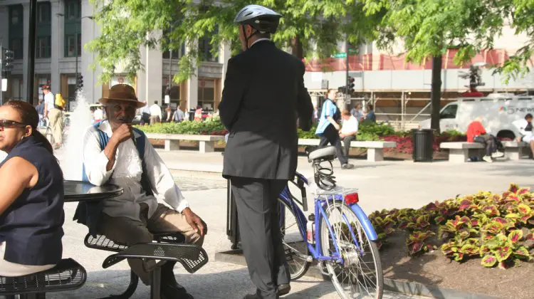 a suited cyclist spotted at the Bike to Work Week rally. © Jordan Fischer via Flickr