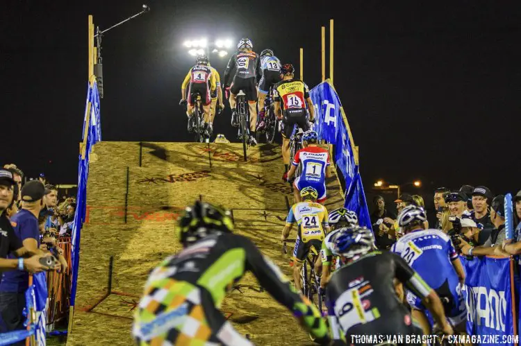 The men snake their way over the Shimano flyover. 2014 CrossVegas © Thomas van Bracht / Peloton Photos