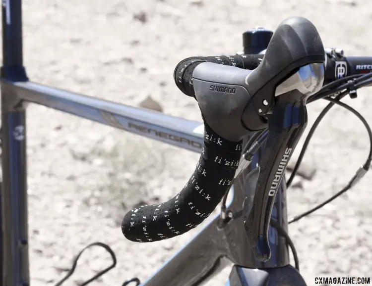 Shimano ST-R685 shifters and Fizik superlight touch decorate the handlebars. © Cyclocross Magazine