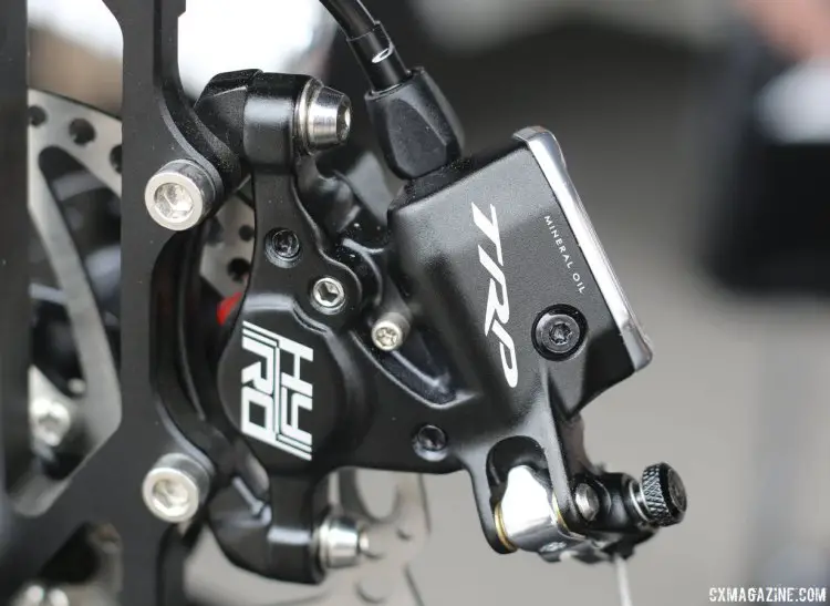 TRP Brakes updated the HY/RD cable-pull hydraulic disc brake. New models have "Mineral Oil" printed on the outside of the brake. Older ones had it on the inside. © Cyclocross Magazine