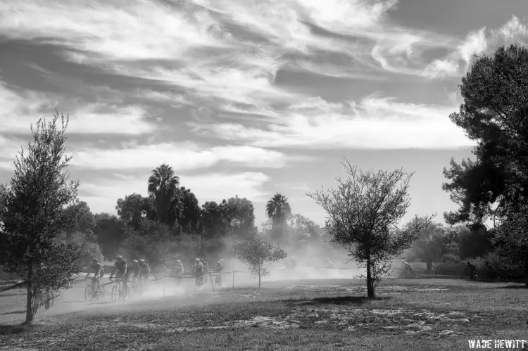 The Cs race kicking up a cloud of dust. © Wade Hewitt