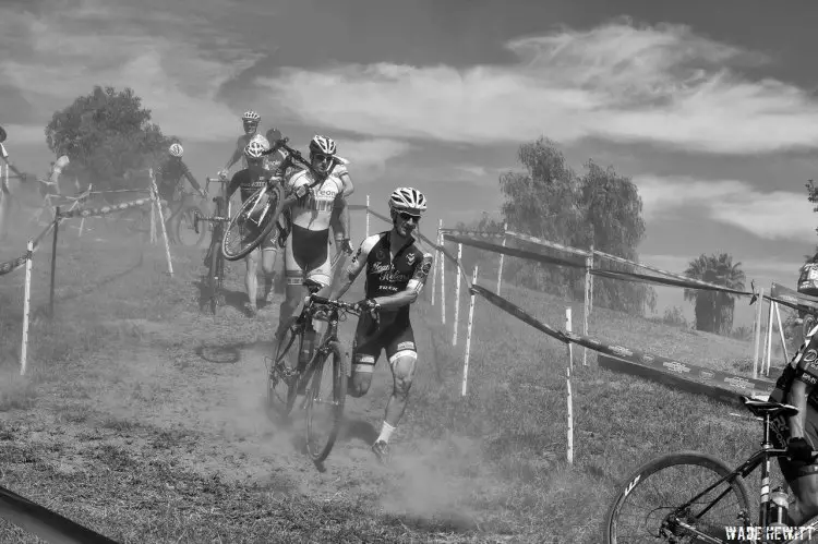 Bruce Weyman, Squareone, (shouldering his bike) and Matias Mendigochea, Helen's Cycling (running his bike in front of Bruce) negotiate the double run-up section in the 35+ As race.  Matias went on to take 2nd place. © Wade Hewitt