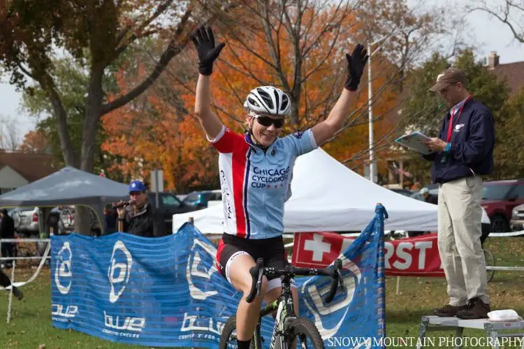 At Todd Busteed's instructions, Kelli Richter (Libertyville, IL) posts up to celebrate her victory in the Women's 1/2/3 race. © Snowy Mountain Photography 