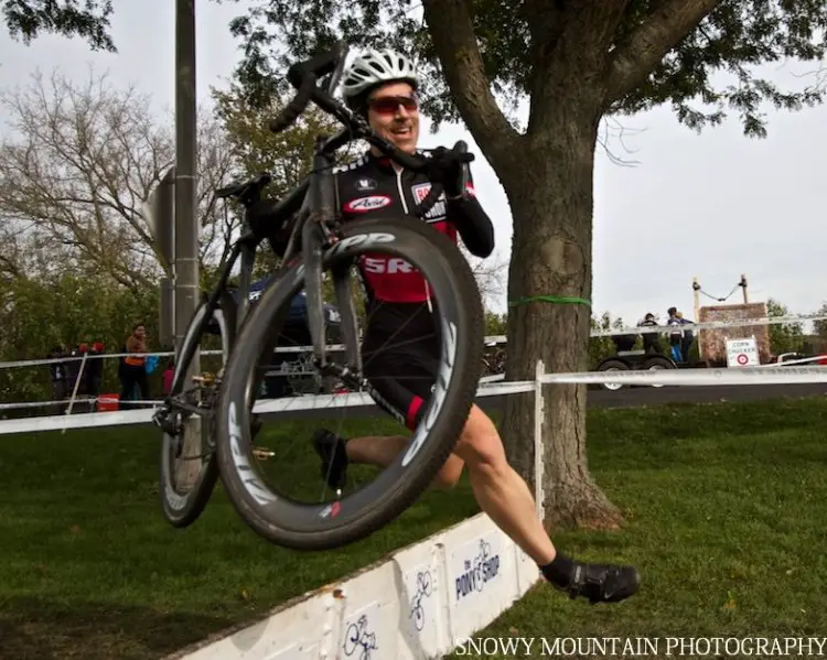 Scott McLaughlin (Chicago, IL) clears a barrier right before jumping over a dry creek bed. © Snowy Mountain Photography