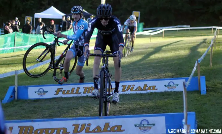 Cameron Dodge hopped the barriers while Zach McDonald dismounted. Both men were able to stay with the lead group of eight riders for the first half of the race. Dodge kept up with Summerhill and eventually took second. © Andrew Reimann