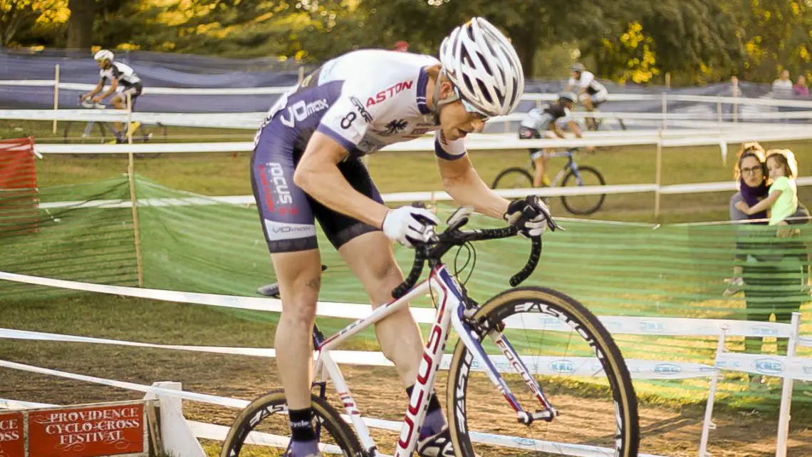 Stephen Hyde attacked extremely early in the race, and bunny-hopped the barriers as often as he could. Jamey Driscoll was one of the lead chasers, shown in the background almost 20 seconds back. © Andrew Reimann