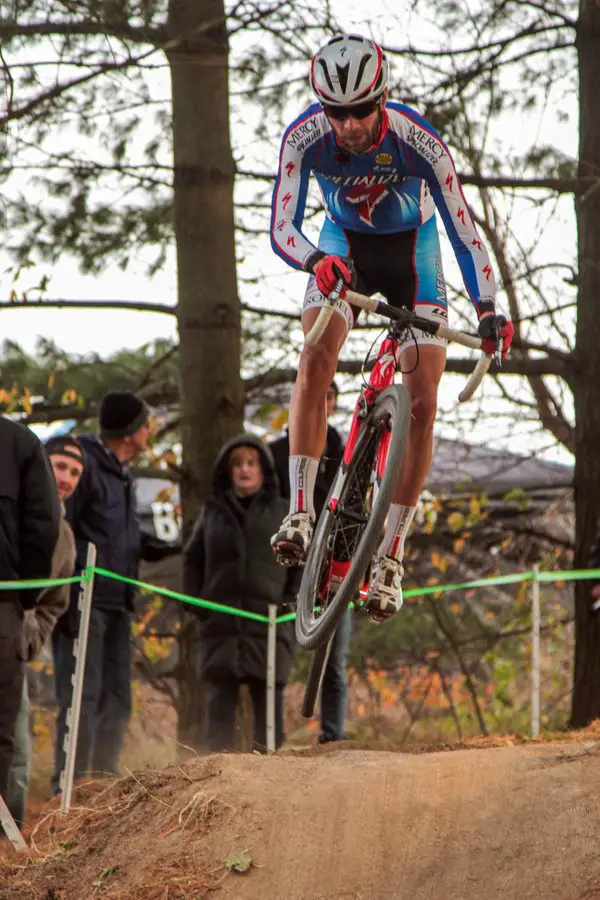 Kevin McConnell (Iowa City, IA) catches some air in the midst of a heated battle for first in the Men's Elite race. © Eric Goodwin