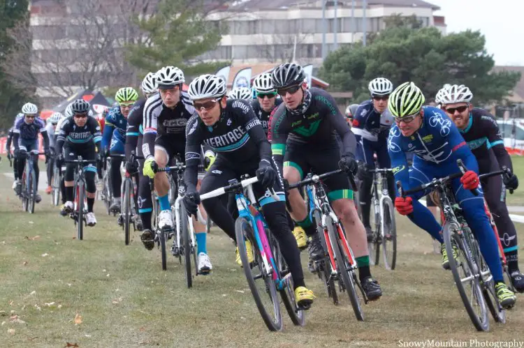 David Reyes (Chicago, IL), Maxx Hall (Niles, IL), and Brian Conant (Dekalb, IL) lead the Men's 1/2/3 field into the first corner on day one of racing at the Hilton Indian Lakes Resort.