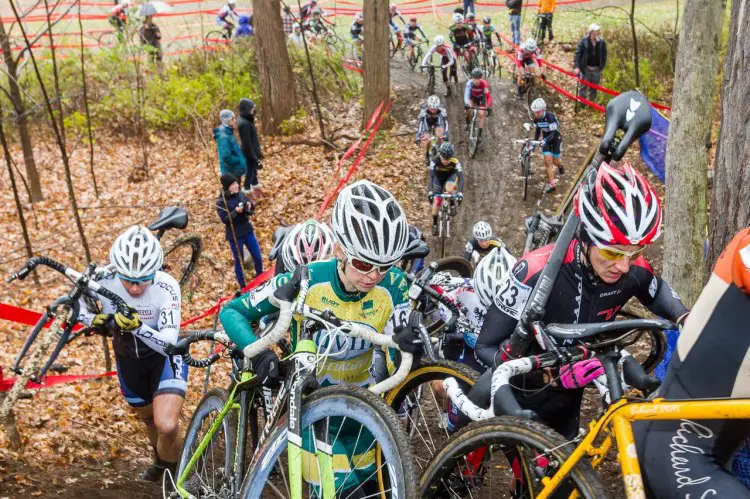 The Elite Women hit the pro-only section of the course, a challenging bit even without today's rain-slicked mud © Todd Prekaski