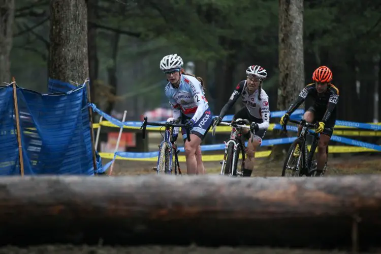 The leaders fly through the log barriers. © Meg McMahon