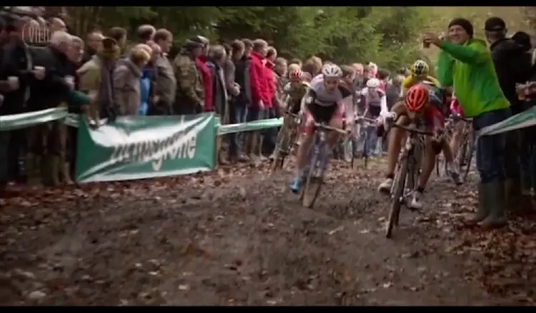 Rob Peeters opting to go beneath man made barriers instead of taking the handup. Photo from Vier/UCI