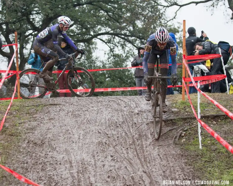 Brendan Rhim (Fuhrman University) and Robert Rimmer (King University) navigate the tree roots and muddy descent. © Brian Nelson