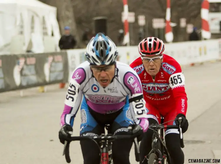 James Alan Coats staring down Sam Morse in the Masters 50-54 race. ©Cyclocross Magazine