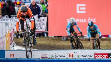 Van der Poel kept risking the barriers, although it took him three laps to get his hopping dialed. © Matthew Lasala / Cyclocross Magazine