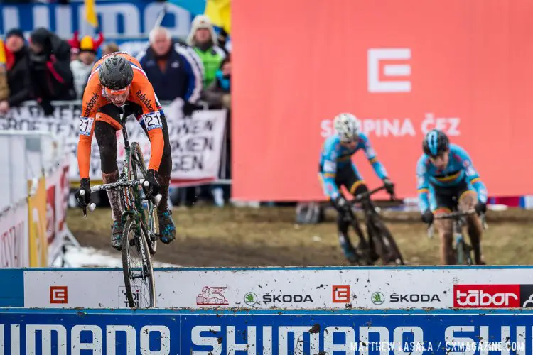 Van der Poel kept risking the barriers, although it took him three laps to get his hopping dialed. © Matthew Lasala / Cyclocross Magazine 